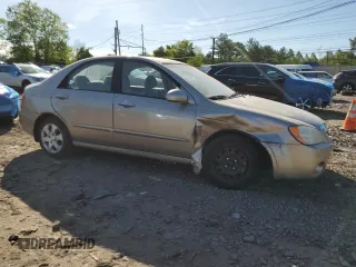 2006 Kia Spectra EX z VIN KNAFE121365269433, wystawiony jako Copart lot #56634735 z przebiegiem 86 551 mil mil oraz Szkoda całkowita • Salvage title. Historia ofert i sprzedaży dostępna na DreamBid. Obrazek 4.