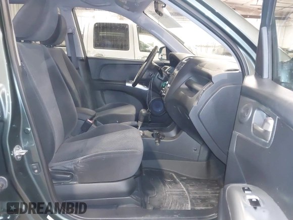 2009 Kia Sportage LX with VIN KNDJE723097558182, listed as a IAAI auction lot 41295142 with 147,200 mi miles. Bid and sale history available at carsss.com. Image 5.