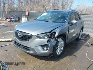 2014 Mazda CX-5 Grand Touring with VIN JM3KE2DY8E0375025, listed as a IAAI auction lot 41657755 with 103,601 mi miles. Bid and sale history available at carsss.com. Image 17.
