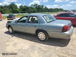 2005 Mercury Grand Marquis GS with VIN 2MEFM74W15X663557, listed as a Copart auction lot 65799904 with 107,483 mi miles and Salvage Title. Bid and sale history available at carsss.com. Image 2.