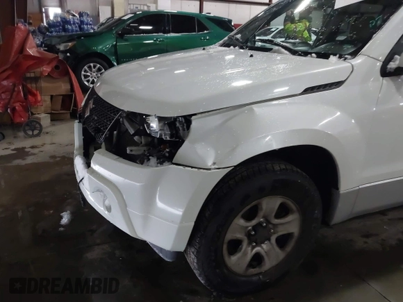 2011 Suzuki Grand Vitara Premium z VIN JS3TD0D24B4101861, wystawiony jako IAAI lot #41620401 z przebiegiem 151 034 mil mil oraz . Historia ofert i sprzedaży dostępna na DreamBid. Obrazek 6.