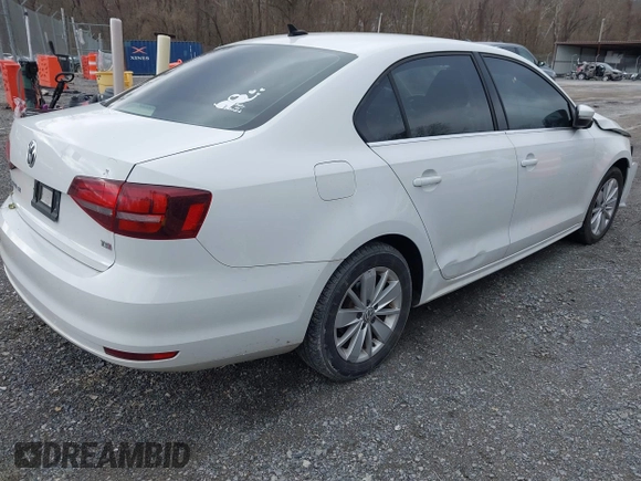 2016 Volkswagen Jetta Sedan 1.4T SE with VIN 3VWD67AJ3GM392427, listed as a IAAI auction lot 41704763 with 84,152 mi miles. Bid and sale history available at carsss.com. Image 4.