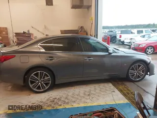 2014 Infiniti Q50 Premium z VIN JN1BV7AR7EM696486, wystawiony jako IAAI lot #41976047 z przebiegiem 145 000 mil mil oraz . Historia ofert i sprzedaży dostępna na DreamBid. Obrazek 12.