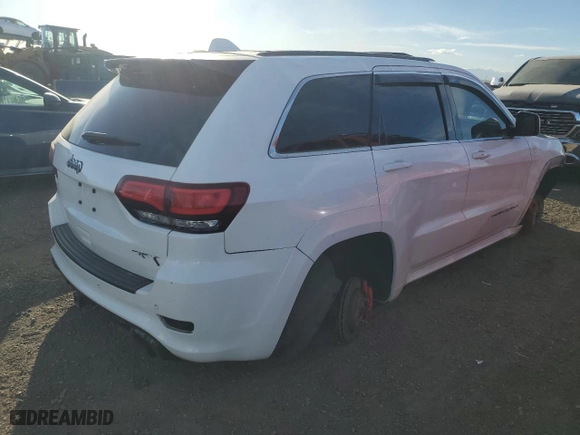 2015 Jeep Grand Cherokee SRT with VIN 1C4RJFDJ8FC687469, listed as a Copart auction lot 85270104 with 0 mi miles and Salvage Title. Bid and sale history available at carsss.com. Image 3.