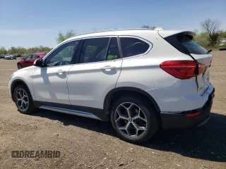 2019 BMW X1 xDrive28i with VIN WBXHT3C51K3H35953, listed as a Copart auction lot 54751675 with 54,802 mi miles and Salvage title. Bid and sale history available at DreamBid. Image 2.