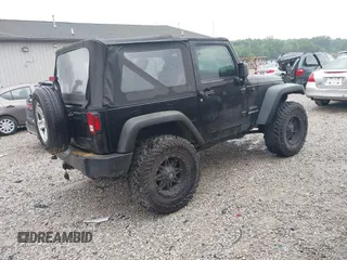 2015 Jeep Wrangler Willys Wheeler with VIN 1C4AJWAG8FL759566, listed as a IAAI auction lot 42716154 with 95,744 mi miles and . Bid and sale history available at DreamBid. Image 4.