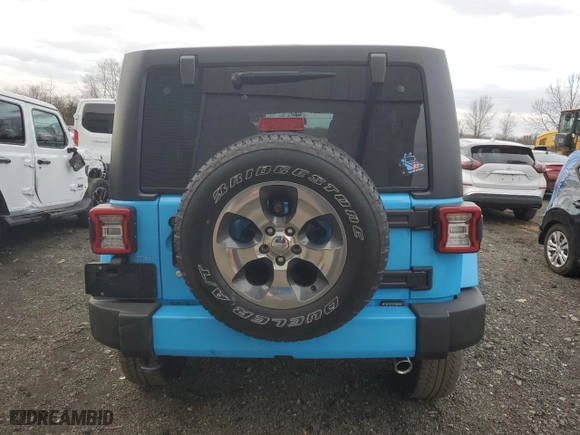 2018 Jeep Wrangler JK Unlimited Sahara with VIN 1C4HJWEG9JL900761, listed as a Copart auction lot 87254504 with 64,491 mi miles and Salvage Title. Bid and sale history available at carsss.com. Image 6.