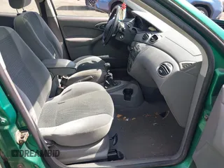 2002 Ford Focus ZX5 z VIN 3FAFP373X2R130965, wystawiony jako IAAI lot #42216638 z przebiegiem 59 236 mil mil oraz . Historia ofert i sprzedaży dostępna na DreamBid. Obrazek 5.