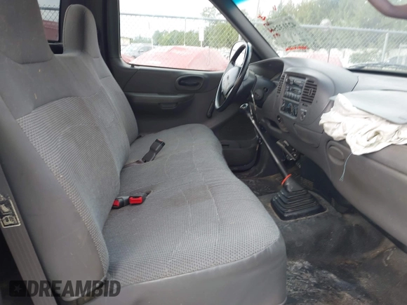 1999 Ford F-150 with VIN 2FTZF1722XCA69178, listed as a IAAI auction lot 42313254 with 197,589 mi miles and . Bid and sale history available at DreamBid. Image 5.