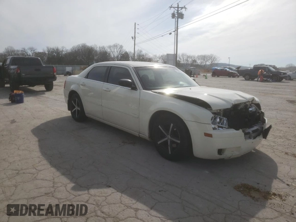 2005 Chrysler 300 with VIN 2C3JA43R25H663094, listed as a Copart auction lot 60813664 with 218,830 mi miles and Salvage Title. Bid and sale history available at carsss.com. Image 4.