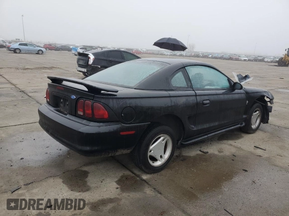1997 Ford Mustang with VIN 1FALP4049VF136060, listed as a Copart auction lot 85389824 with 0 mi miles and Salvage Title. Bid and sale history available at carsss.com. Image 3.
