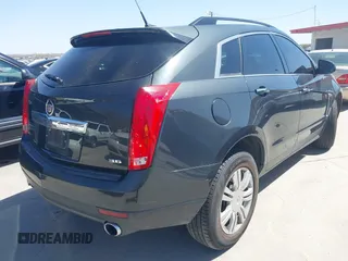 2014 Cadillac SRX z VIN 3GYFNAE35ES610751, wystawiony jako IAAI lot #41832296 z przebiegiem 133 293 mil mil oraz . Historia ofert i sprzedaży dostępna na DreamBid. Obrazek 4.