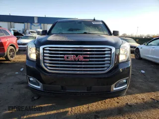 2019 GMC Yukon SLT with VIN 1GKS2BKC5KR308872, listed as a Copart auction lot 89080065 with 82,735 mi miles and Clean Title. Bid and sale history available at carsss.com. Image 5.