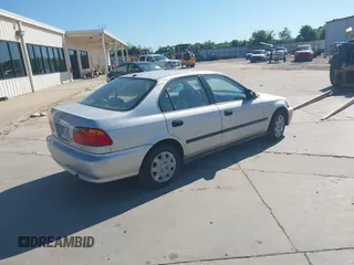 1999 Honda Civic LX with VIN 2HGEJ6678XH581295, listed as a IAAI auction lot 41550824 with 152,277 mi miles and . Bid and sale history available at DreamBid. Image 4.