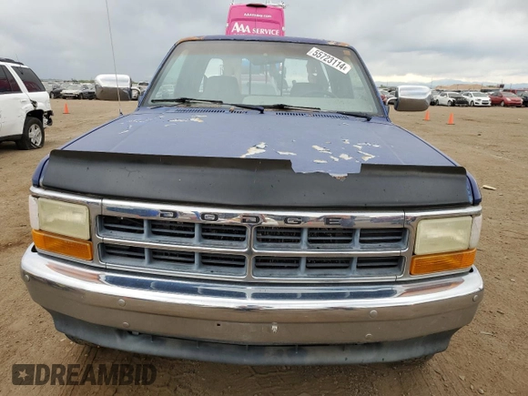 1995 Dodge Dakota z VIN 1B7GG23Y4SS124349, wystawiony jako Copart lot #55723114 z przebiegiem 136 156 mil mil oraz Czysty tytuł • Clean title. Historia ofert i sprzedaży dostępna na DreamBid. Obrazek 5.