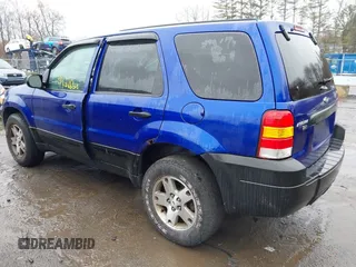 2005 Ford Escape XLT with VIN 1FMCU93125KA41795, listed as a IAAI auction lot 41931869 with 156,421 mi miles and . Bid and sale history available at DreamBid. Image 3.