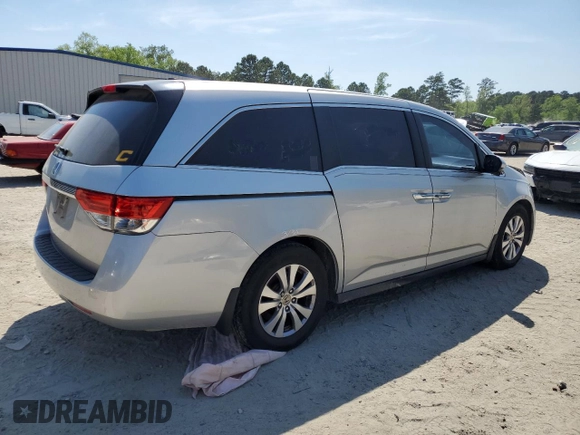 2015 Honda Odyssey EX-L with VIN 5FNRL5H66FB112090, listed as a Copart auction lot 52721475 with 120,472 mi miles and Salvage Title. Bid and sale history available at DreamBid. Image 3.