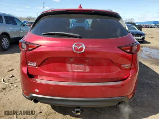2021 Mazda CX-5 Signature with VIN JM3KFBEYXM0434778, listed as a Copart auction lot 51980255 with 34,283 mi miles and Salvage Title. Bid and sale history available at carsss.com. Image 6.