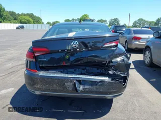 2021 Volkswagen Passat SE z VIN 1VWSA7A30MC003988, wystawiony jako IAAI lot #42238431 z przebiegiem 43 208 mil mil oraz . Historia ofert i sprzedaży dostępna na DreamBid. Obrazek 16.