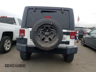 2018 Jeep Wrangler JK Unlimited Sport S with VIN 1C4BJWDG9JL825714, listed as a Copart auction lot 73287794 with 103,643 mi miles and Salvage Title. Bid and sale history available at carsss.com. Image 6.