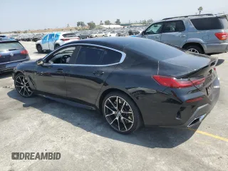 2020 BMW 8 Series M850i with VIN WBAGV8C01LCE50737, listed as a Copart auction lot 58318665 with Not provided miles and Salvage title. Bid and sale history available at DreamBid. Image 2.