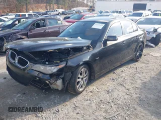 2007 BMW 5 Series 525i with VIN WBANE53517CW62137, listed as a IAAI auction lot 41163353 with 224,428 mi miles and . Bid and sale history available at carsss.com. Image 17.