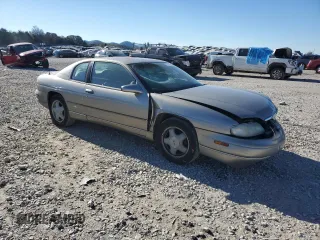 1999 Chevrolet Monte Carlo LS с VIN 2G1WW12M7X9100412, выставлен на аукционе Copart как лот 80311224 с пробегом 90 441 миль миль и Списание • Salvage title. История ставок и продаж доступна на DreamBid. Изображение 4.