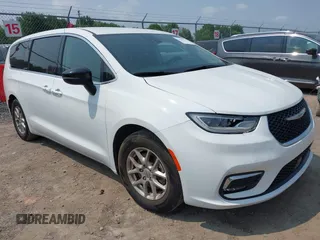 2024 Chrysler Pacifica Touring L with VIN 2C4RC1BG6RR124775, listed as a IAAI auction lot 42427434 with 61,052 mi miles and . Bid and sale history available at DreamBid. Image 1.