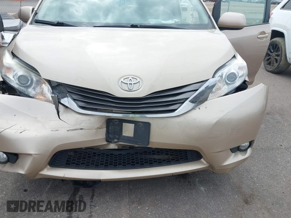 2013 Toyota Sienna XLE with VIN 5TDDK3DC4DS055796, listed as a IAAI auction lot 41993530 with 256,735 mi miles and . Bid and sale history available at DreamBid. Image 6.