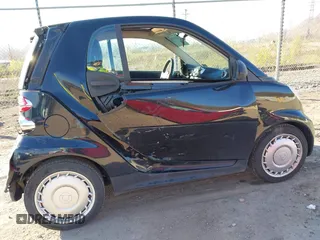 2015 Smart fortwo Passion with VIN WMEEJ3BA6FK804974, listed as a IAAI auction lot 42041904 with 97,514 mi miles and . Bid and sale history available at DreamBid. Image 6.