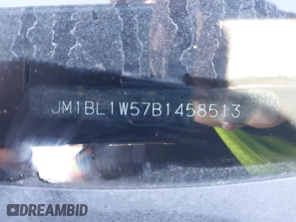2011 Mazda 3 S Grand Touring with VIN JM1BL1W57B1458513, listed as a IAAI auction lot 41585432 with Not Provided miles and . Bid and sale history available at DreamBid. Image 9.