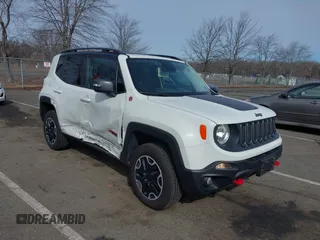 2015 Jeep Renegade Trailhawk with VIN ZACCJBCT6FPB32422, listed as a IAAI auction lot 41618410 with 42,219 mi miles and . Bid and sale history available at DreamBid. Image 6.