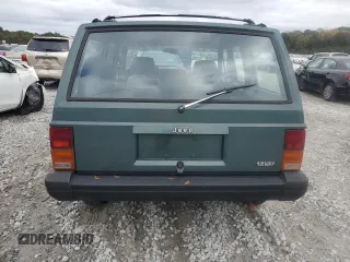 1993 Jeep Cherokee Sport with VIN 1J4FT68S4PL588241, listed as a Copart auction lot 80115884 with 204,174 mi miles and Salvage Title. Bid and sale history available at carsss.com. Image 6.