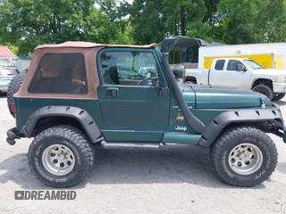 2000 Jeep Wrangler Sahara with VIN 1J4FA59S8YP722208, listed as a IAAI auction lot 42294978 with 238,024 mi miles and . Bid and sale history available at DreamBid. Image 13.