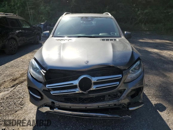 2018 Mercedes-Benz GLE 350 z VIN 4JGDA5HB6JB200366, wystawiony jako Copart lot #62200145 z przebiegiem 68 299 mil mil oraz Szkoda całkowita • Salvage title. Historia ofert i sprzedaży dostępna na DreamBid. Obrazek 5.