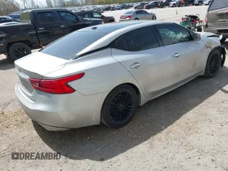 2016 Nissan Maxima SV z VIN 1N4AA6APXGC383279, wystawiony jako IAAI lot #42144003 z przebiegiem 141 099 mil mil oraz . Historia ofert i sprzedaży dostępna na DreamBid. Obrazek 4.