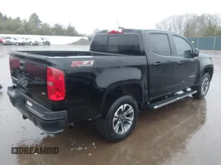 2022 Chevrolet Colorado 4WD Z71 with VIN 1GCGTDEN4N1205498, listed as a IAAI auction lot 41708863 with 54,515 mi miles and . Bid and sale history available at DreamBid. Image 4.