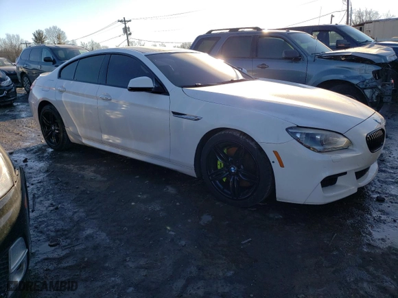 2015 BMW 6 Series 650i xDrive with VIN WBA6B4C51FD761301, listed as a Copart auction lot 42350655 with 0 mi miles and Salvage Title. Bid and sale history available at carsss.com. Image 4.
