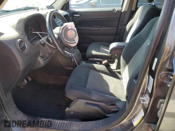 2014 Jeep Patriot Latitude with VIN 1C4NJRFB1ED847612, listed as a Copart auction lot 62721605 with 126,268 mi miles and Salvage title. Bid and sale history available at DreamBid. Image 7.