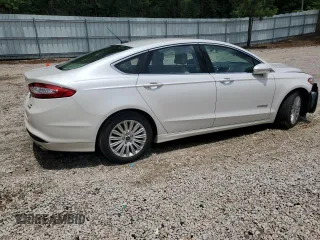 2015 Ford Fusion SE Hybrid with VIN 3FA6P0LU1FR210884, listed as a Copart auction lot 60035595 with 125,798 mi miles and Salvage title. Bid and sale history available at DreamBid. Image 3.
