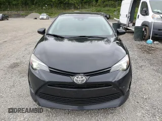 2019 Toyota Corolla L z VIN 5YFBURHE6KP870832, wystawiony jako Copart lot #57884205 z przebiegiem 132 860 mil mil oraz Szkoda całkowita • Salvage title. Historia ofert i sprzedaży dostępna na DreamBid. Obrazek 5.