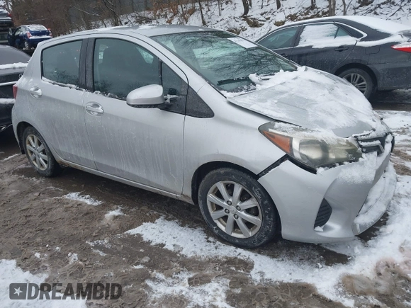 2015 Toyota Yaris L with VIN VNKKTUD32FA017551, listed as a IAAI auction lot 41267892 with 122,506 mi miles. Bid and sale history available at carsss.com. Image 1.