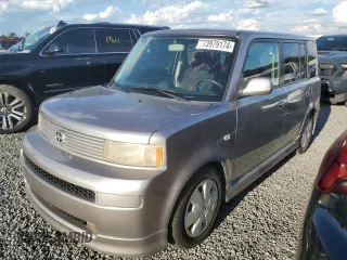 2006 Scion xB with VIN JTLKT324164053183, listed as a Copart auction lot 73979174 with Not Provided miles and Clean Title. Bid and sale history available at carsss.com. Image 1.