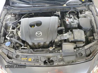 2019 Mazda 3 Select z VIN JM1BPACL2K1106950, wystawiony jako Copart lot #59481345 z przebiegiem 56 582 mil mil oraz Szkoda całkowita • Salvage title. Historia ofert i sprzedaży dostępna na DreamBid. Obrazek 11.