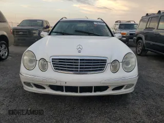 2004 Mercedes-Benz E 320 with VIN WDBUH65J64A428426, listed as a Copart auction lot 75079234 with 186,980 mi miles and Salvage Title. Bid and sale history available at DreamBid. Image 5.