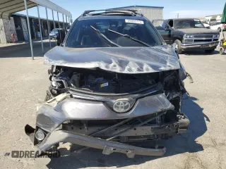 2018 Toyota RAV4 XLE with VIN JTMWFREV6JJ172451, listed as a Copart auction lot 58095775 with Not provided miles and Salvage title. Bid and sale history available at DreamBid. Image 5.