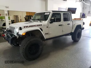 2020 Jeep Gladiator Rubicon with VIN 1C6JJTBG8LL121687, listed as a Copart auction lot 66404935 with 52,884 mi miles and Clean title. Bid and sale history available at DreamBid. Image 1.