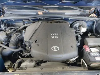 2014 Toyota Tacoma with VIN 3TMLU4EN4EM156933, listed as a IAAI auction lot 41197904 with 128,183 mi miles. Bid and sale history available at carsss.com. Image 10.