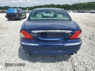 2004 Jaguar X-Type with VIN SAJEA51C44WD83361, listed as a Copart auction lot 55643545 with 54,615 mi miles and Salvage Title. Bid and sale history available at DreamBid. Image 6.