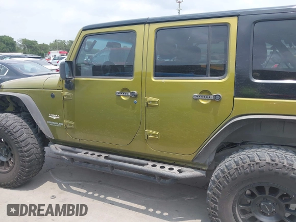 2008 Jeep Wrangler Unlimited Sahara with VIN 1J8GA59108L574959, listed as a IAAI auction lot 42171011 with Not Provided miles and . Bid and sale history available at carsss.com. Image 14.